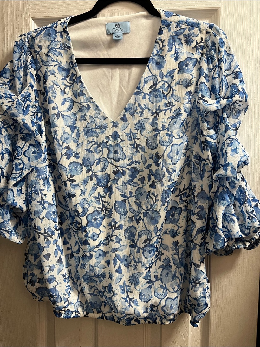 CeCe Blue and White Floral V-Neck Ruffle Sleeve Blouse